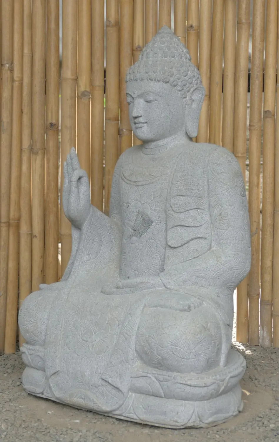  Product image 3 of the product “Seated Buddha with floral carving - Abhaya position. About 68cm length, 42cm width, 100cm height. Natural stone (river stone), stonemasonry ”